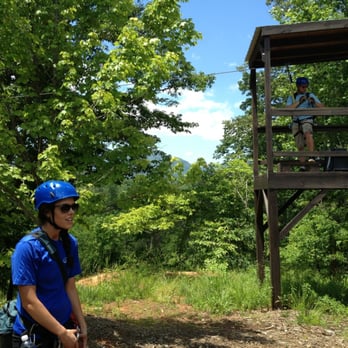 Canopy Ridge Farm - Guide Leslie showing us the first jump. - Ziplining Near Me - Lake Lure, North Carolina