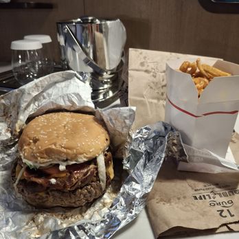 The Shopping Bag - The Sizzler with a side of curly seasoned fries - Burgers Near Me - Burlington, Vermont The Shopping Bag - The Sizzler with a side of curly seasoned fries - Burgers Near Me - Burlington, Vermont