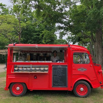 Bubble & Brew - a red food truck parked in a park - Coffee & Tea Near Me