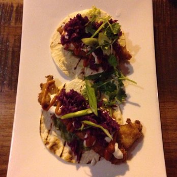 2 Doors Down - Haddock tacos - breaded fish with red cabbage slaw, cilantro, and tasty taco sauce. - Canadian (New) Near Me - Halifax, Nova Scotia