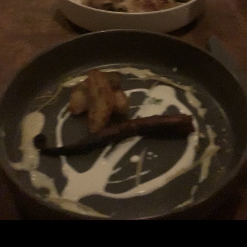 Brix 25 - The tiny octopus appetizer (excuse poor quality as it is a screenshot from a video) - New American Near Me - Gig Harbor, Washington