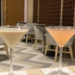 two cocktails on a table