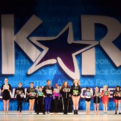 Kelyla's Performing Art Center - One of our students receiving our group award at KAR competition. 6th dancer from the right hand side.