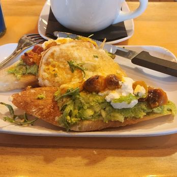 Bird Tree Cafe - Hass Queen Toast (underneath dressed greens) - Cafes Near Me - Colorado Springs, Colorado Bird Tree Cafe - Hass Queen Toast (underneath dressed greens) - Cafes Near Me - Colorado Springs, Colorado