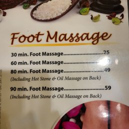 The menu offers foot massage options from 30 to 90 minutes, with prices ranging from $25 to $59, including hot stone and oil treatments.