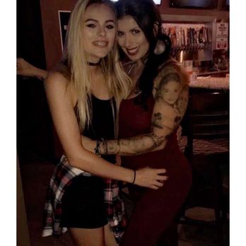3rd Base Sports Bar - two girls hugging each other - Sports Bars Near Me - Upland, California