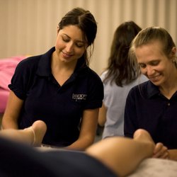 Bancroft School of Massage Therapy - Two students working together for plantar fasciitis pathology.