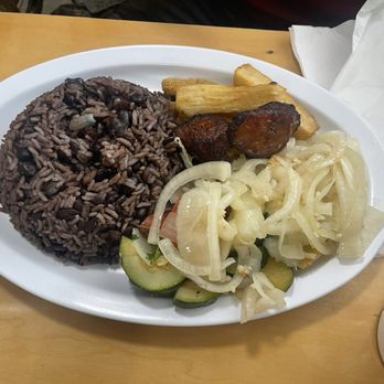 Palaus Restaurant - a plate of food on a table - Cuban Near Me - Tampa, Florida Palaus Restaurant - a plate of food on a table - Cuban Near Me - Tampa, Florida