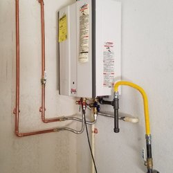 Spyder Plumbing - After. Now they have a tankless instead of a tank type.