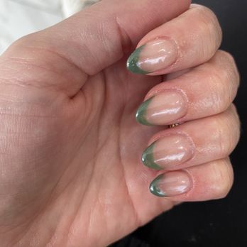 Mosaic Nail Spa - Pinky appeared to be bleeding underneath (darkness). Uneven and weird design and bubbling from the glue. - Waxing Near Me - Falls Church, Virginia