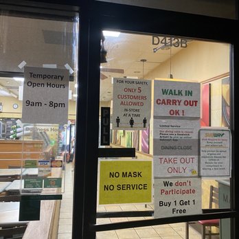 Subway - a window with signs on the outside of it - Sandwiches Near Me - Waianae, Hawaii