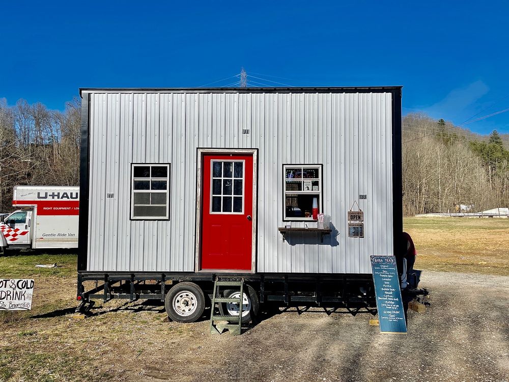 The Six Broomsticks Logo