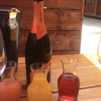 Capo Restaurant - Bucket of bubbles ( grapefruit, Orange, and cranberry juice) - Bars Near Me - Boston, Massachusetts