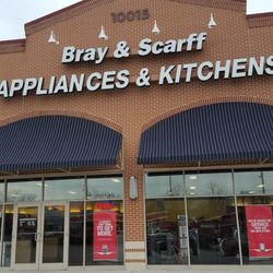 Bray & Scarff - Outside view of a brick building with white lettering that says" Bray & Scarff Appliances & Kitchens"