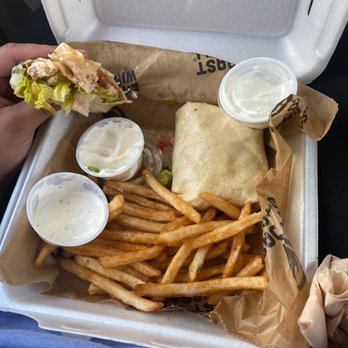 East Coast Wings + Grill - Buffalo chicken wrap with sour cream, lettuce, tomatoes and cheese, a side of fries and ranch sauce - Chicken Wings Near Me - Kinston, North Carolina East Coast Wings + Grill - Buffalo chicken wrap with sour cream, lettuce, tomatoes and cheese, a side of fries and ranch sauce - Chicken Wings Near Me - Kinston, North Carolina
