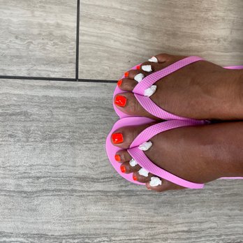 Nail Fever - Pedicures feet with Color Club orange polish. - Nail Salons Near Me - Fayetteville, Georgia Nail Fever - Pedicures feet with Color Club orange polish. - Nail Salons Near Me - Fayetteville, Georgia