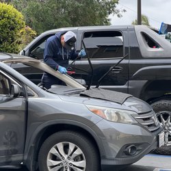 California Auto Glass Repair - Marco working his magic!