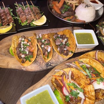 Imperial Kitchen and Bar - Skewered pork loin Lomo Saltado Birria Taco Asada Taco Asada Nacho Pomegranate Mojito Lychee Martini Pisco Sour - Cocktail Bars Near Me - Seattle, Washington
