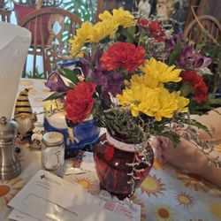 Clay Center Floral - This purpose to be  a full flower with a better selection of flowers including roses and a larger size this is not worth 50 dollars