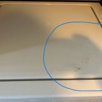 Beach Realty & Construciton - The mess left behind by their technician after he removed the lint from the dryer. - Real Estate Services Near Me - Kitty Hawk, North Carolina
