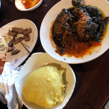 Ike's Cafe and Grill - Fufu red beef & chicken soup mixed with potato Leafs. - African Near Me - Norcross, Georgia