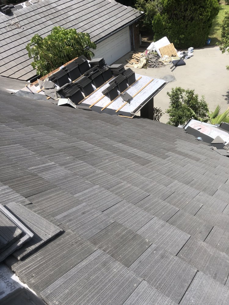 Slide of Top Elite Roofing
