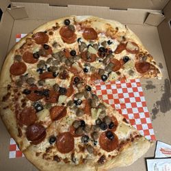 Di's Homemade Pizza - Pizza with pepperoni, sausage, black olives, and pineapple
