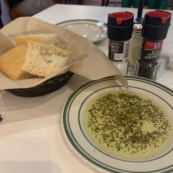 Mandola's Italian Kitchen - Complementary bread and olive oil - Bakeries Near Me - Tampa, Florida Mandola's Italian Kitchen - Complementary bread and olive oil - Bakeries Near Me - Tampa, Florida