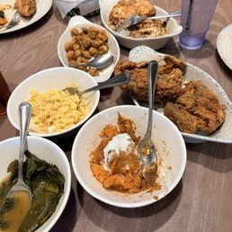Collard greens, candied yams, mac 'n cheese, fried chicken, okra, pork tenderloin and the last two cheese rolls. Collard greens, candied yams, mac 'n cheese, fried chicken, okra, pork tenderloin and the last two cheese rolls.