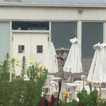 Rosarito Beach Hotel - Cleaning the umbrellas. I've never seen that before. - Hotels Near Me - Rosarito, BCN Rosarito Beach Hotel - Cleaning the umbrellas. I've never seen that before. - Hotels Near Me - Rosarito, BCN