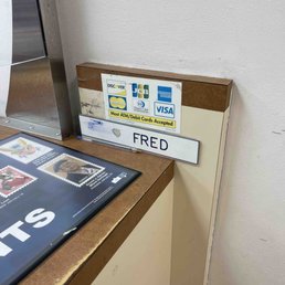 Fred doesn't work here anymore. But his name plate remains. Fred doesn't work here anymore. But his name plate remains.