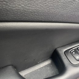Side of driver door Side of driver door