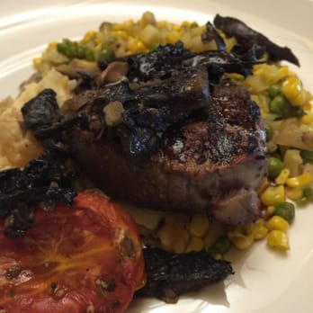 Seasons 52 - Filet mignon red wine reduction succotash and sautéed mushrooms with roasted tomato - New American Near Me - Sarasota, Florida Seasons 52 - Filet mignon red wine reduction succotash and sautéed mushrooms with roasted tomato - New American Near Me - Sarasota, Florida