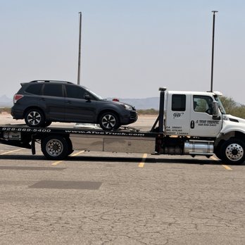 A Toe Truck - Vehicle being towed - Towing Near Me - Parker, Arizona A Toe Truck - Vehicle being towed - Towing Near Me - Parker, Arizona