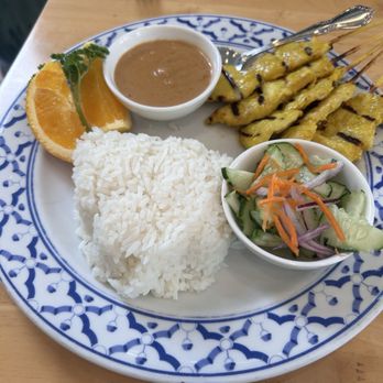 Regent Thai Restaurant - Chicken satay with peanut sauce and cucumber salad - Thai Near Me - San Francisco, California Regent Thai Restaurant - Chicken satay with peanut sauce and cucumber salad - Thai Near Me - San Francisco, California