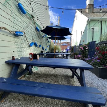 Hooked - Alleyway seating. - Seafood Near Me - Montauk, New York