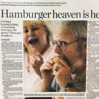 Five Guys - Article on wall about 5 guys. The lady in the photo looks like Vigo the Carpathian in Ghostbusters 2 when he starts morphing into a demon. - Burgers Near Me - Pinecrest, Florida