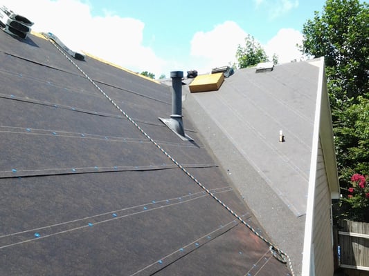 Manna Roof & Construction Logo