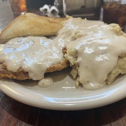 Longhorn Cafe - Chicken Fried Steak with mashed potatoes and gravy.
