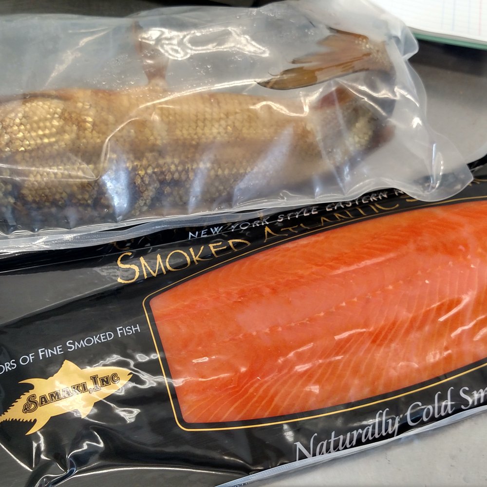 Samaki - two packages of smoked salmon on a table - Seafood Markets Near Me - Port Jervis, New York Samaki - two packages of smoked salmon on a table - Seafood Markets Near Me - Port Jervis, New York