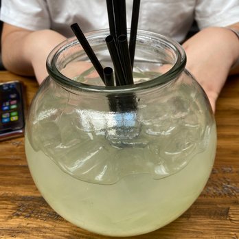 Graffiti Bar - a person sitting at a table with a glass of lemonade - Lounges Near Me - Philadelphia, Pennsylvania Graffiti Bar - a person sitting at a table with a glass of lemonade - Lounges Near Me - Philadelphia, Pennsylvania