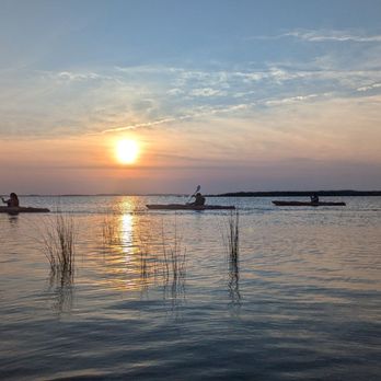 Coastal Explorations - Kayakers and Currituck Sound in a lavender sunset - Rafting/Kayaking Near Me - Currituck, North Carolina