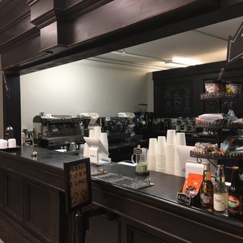 Exchange Coffee House - a counter with coffee cups on it - Coffee & Tea Near Me - De Pere, Wisconsin Exchange Coffee House - a counter with coffee cups on it - Coffee & Tea Near Me - De Pere, Wisconsin