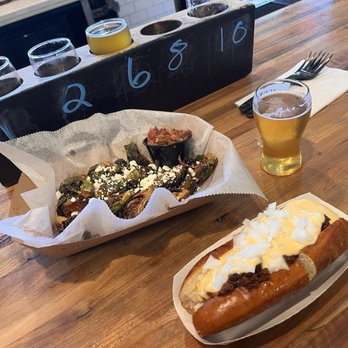 Brew Belly - Crispy Brussel Sprouts with bacon on the side and chili dog on a pretzel bun!! - Beer, Wine & Spirits Near Me - Olney, Maryland