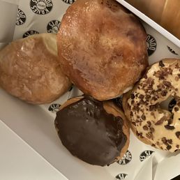 Jelly, crème brûlée, Boston cream, maple bacon donuts