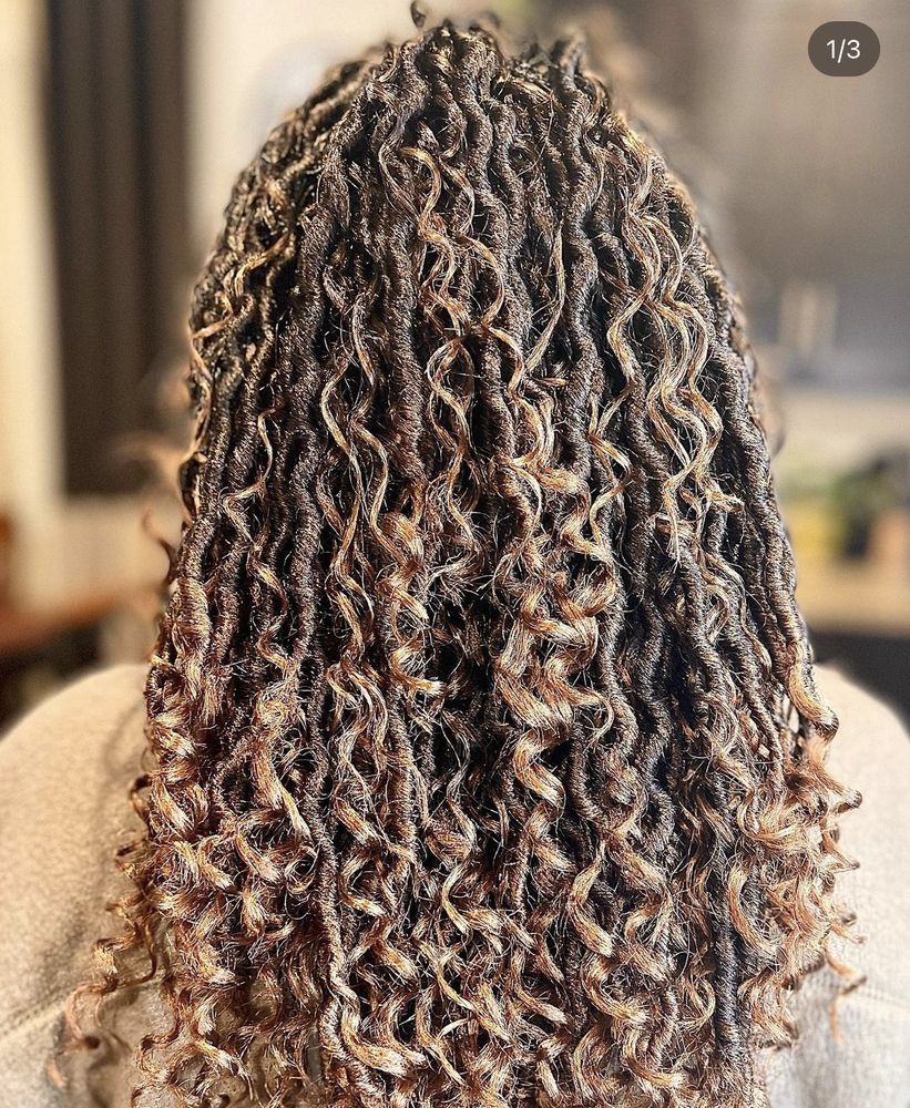 Ruby Does Braids Logo