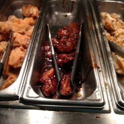 Winn-Dixie - This is Winn Dixie's self serve deli. Note handles that customer just touched with his dirty hands laying in food.