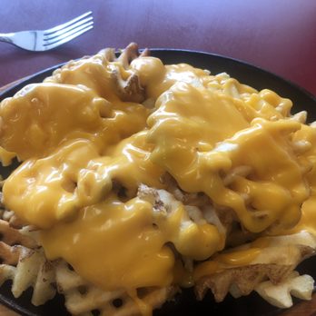 Wings To Go - Feasterville - a plate of fries covered in cheese - American Near Me - Feasterville, Pennsylvania Wings To Go - Feasterville - a plate of fries covered in cheese - American Near Me - Feasterville, Pennsylvania