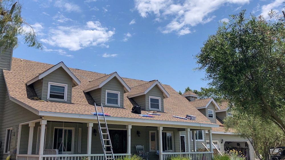 Slide of Sandoval Roofing