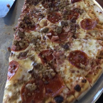 Island Pizza - Half of a XL Hogs and Hooves pizza - Pizza Near Me - Sanibel, Florida
